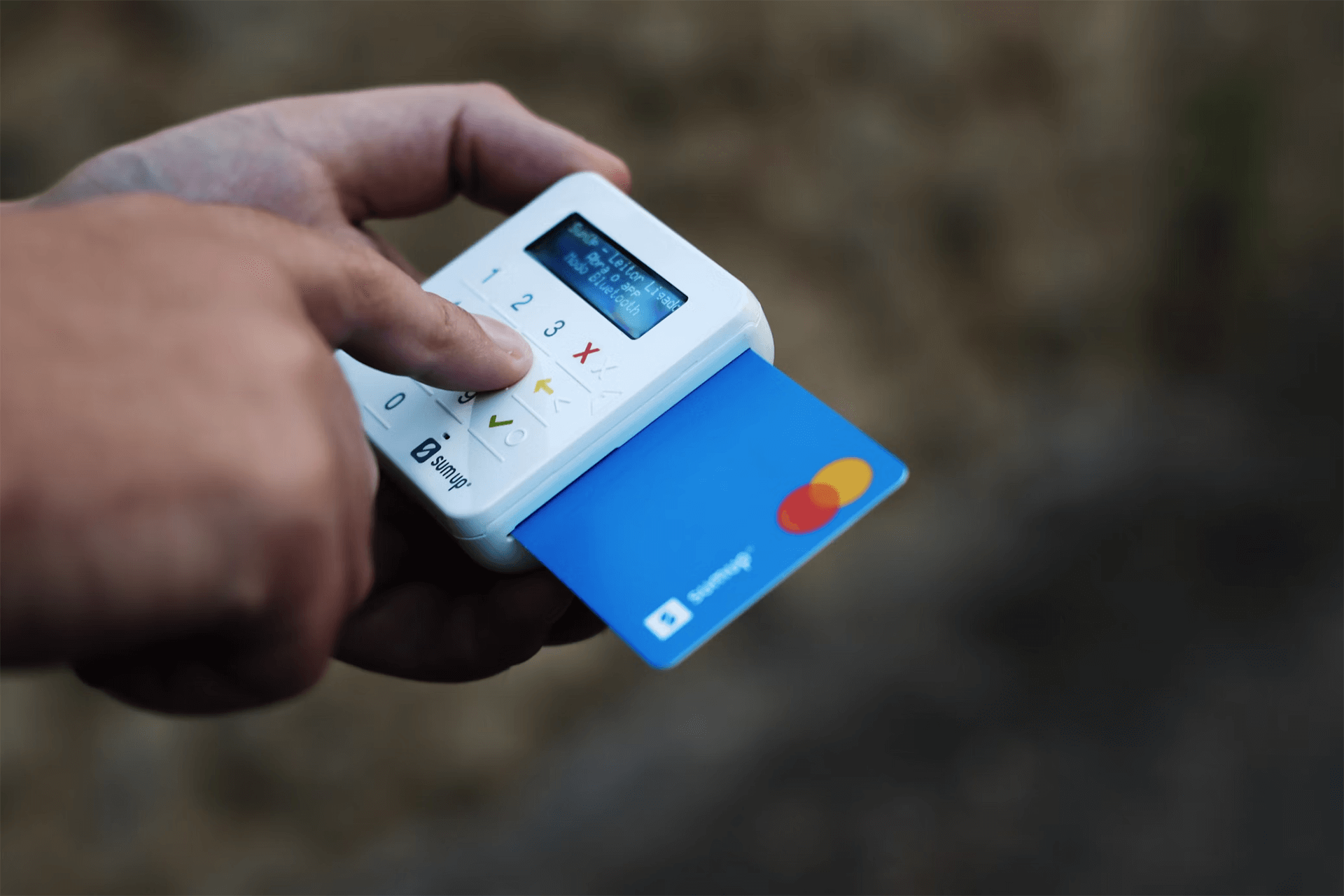 Inserting PIN into card terminal.